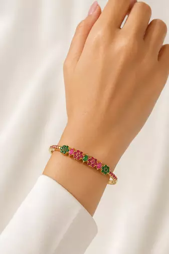 Gold-plated floral kada bracelet with ruby & emerald stones openable free size 