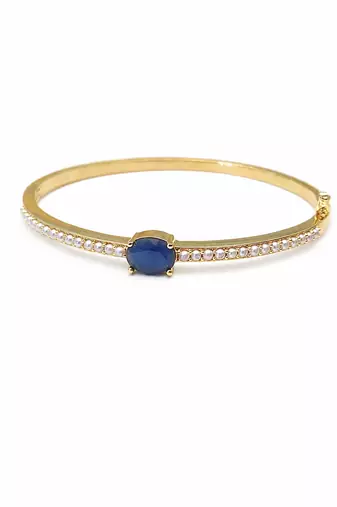 Gold-toned kada bangle with blue oval stone and pearl accents openable free size 