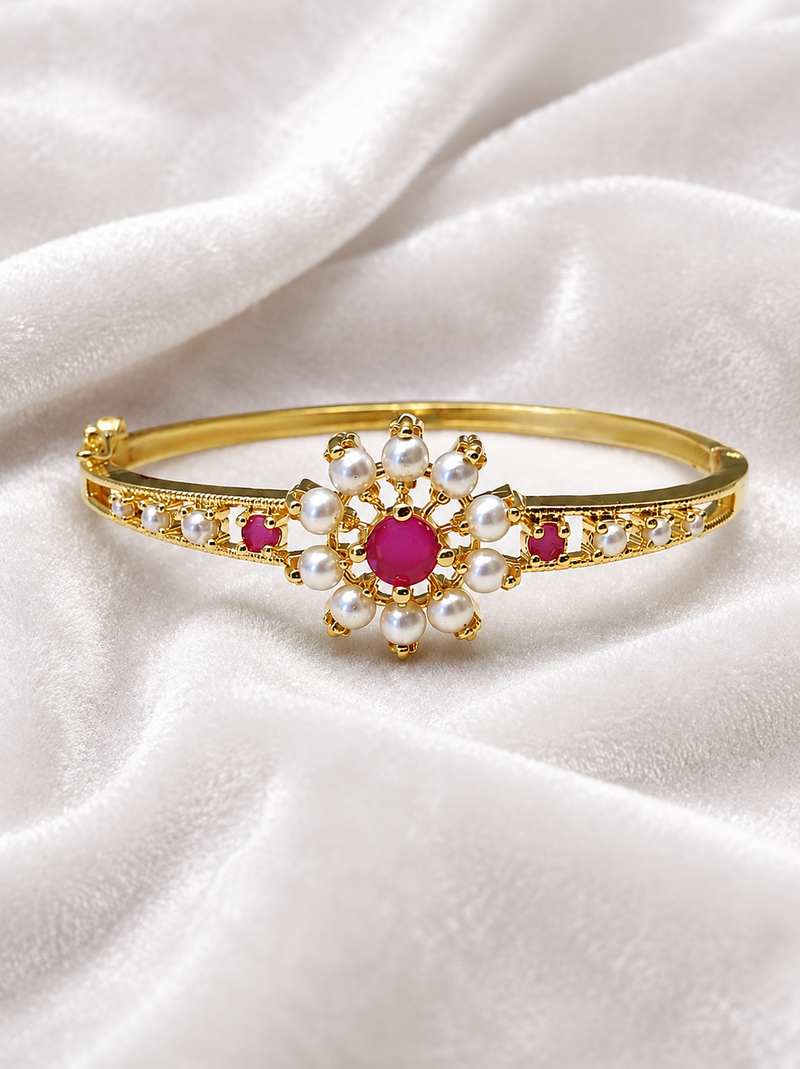 Gold-plated floral bangle with ruby and pearl stones openable free size 