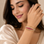Gold-toned ruby & pearl floral kada bangle, openable free size 
