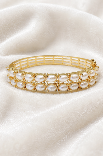 Double row pearl kada bangle with gold-tone setting openable free size 