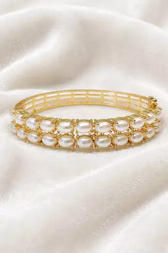 Double row pearl kada bangle with gold-tone setting openable free size 