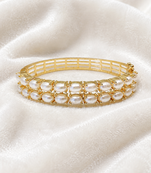 Double row pearl kada bangle with gold-tone setting openable free size 