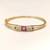 Gold-plated kada bangle with ruby and pearl embellishment openable free size 