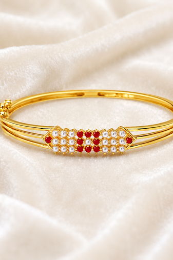 Gold-plated kada bracelet with ruby and pearl embellishments openable free size 