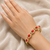 Gold-toned coral stone and pearl kada openable bangle free size 