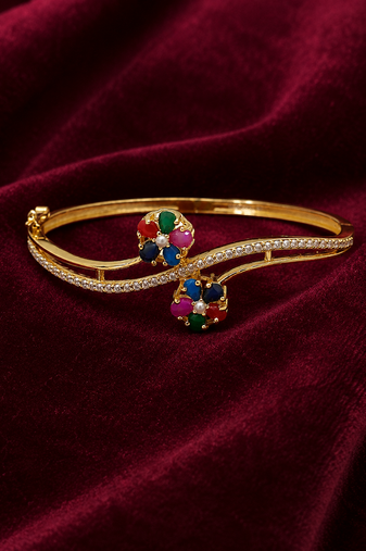 Gold-plated navratan floral kada bracelet with cz stones openable free size 