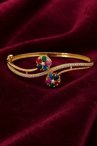 Gold-plated navratan floral kada bracelet with cz stones openable free size 