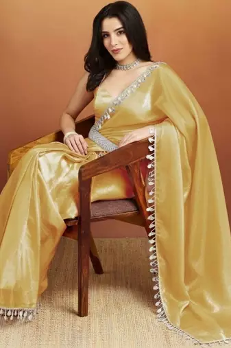 Yellow plain tissue festive wear saree with blouse piece