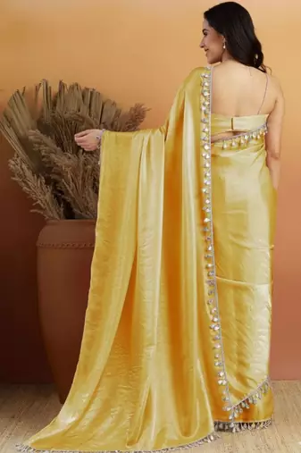 Yellow plain tissue festive wear saree with blouse piece