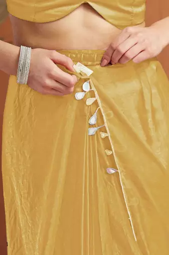 Yellow plain tissue festive wear saree with blouse piece