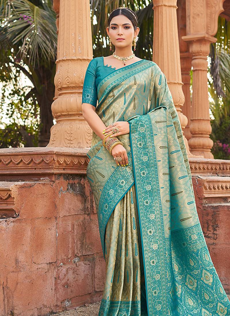 Women's turquoise soft banarasi silk blend zari woven saree with blouse