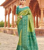 Women's green soft banarasi silk blend zari woven saree with blouse