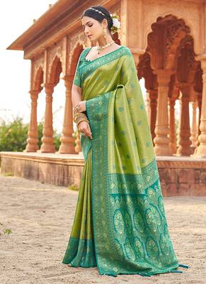Women's green soft banarasi silk blend zari woven saree with blouse 2