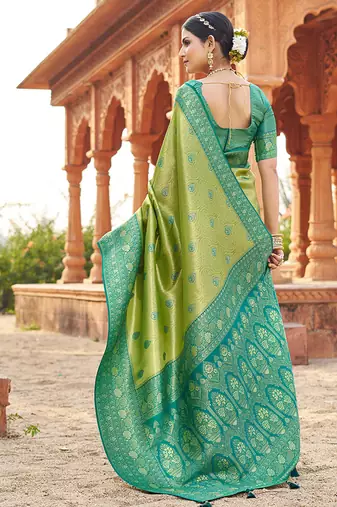Women's green soft banarasi silk blend zari woven saree with blouse