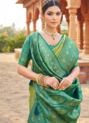 Women's green soft banarasi silk blend zari woven saree with blouse 4
