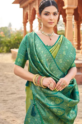 Women's green soft banarasi silk blend zari woven saree with blouse