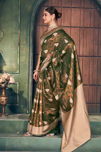 Bottle green soft banarasi silk blend saree with gold zari motifs and contrast blouse