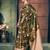 Bottle green soft banarasi silk blend saree with gold zari motifs and contrast blouse