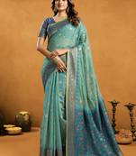 Sea green cotton blend zari woven work saree with blouse piece