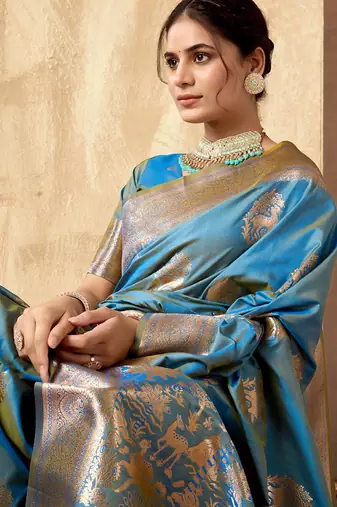 Light blue banarasi silk blend zari weaving saree with blouse piece