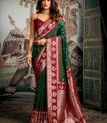 Dark green soft banarasi silk blend saree with blouse piece