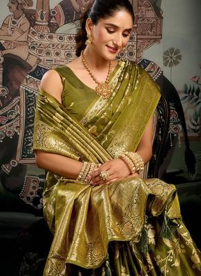 Olive green woven soft kanjivaram style silk blend saree for wedding 4