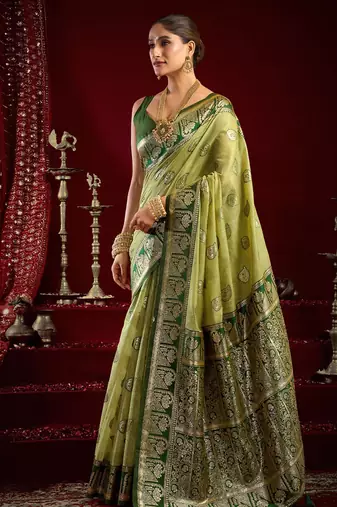 Light green soft banarasi silk blend zari woven saree with blouse piece