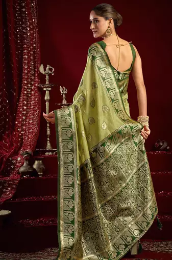 Light green soft banarasi silk blend zari woven saree with blouse piece