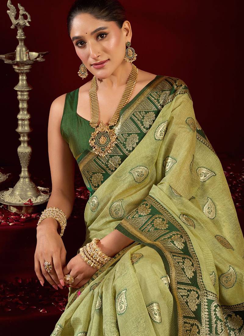 Light green soft banarasi silk blend zari woven saree with blouse piece