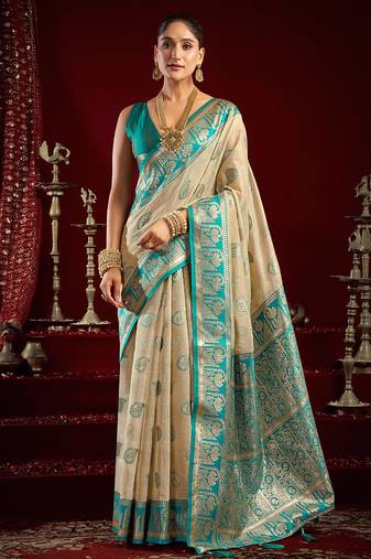 Cream soft banarasi silk blend zari woven saree with blouse piece