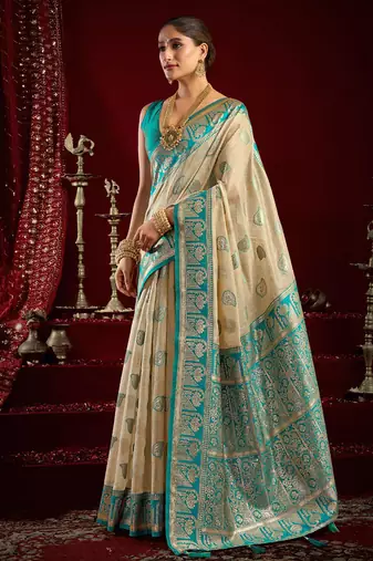Cream soft banarasi silk blend zari woven saree with blouse piece