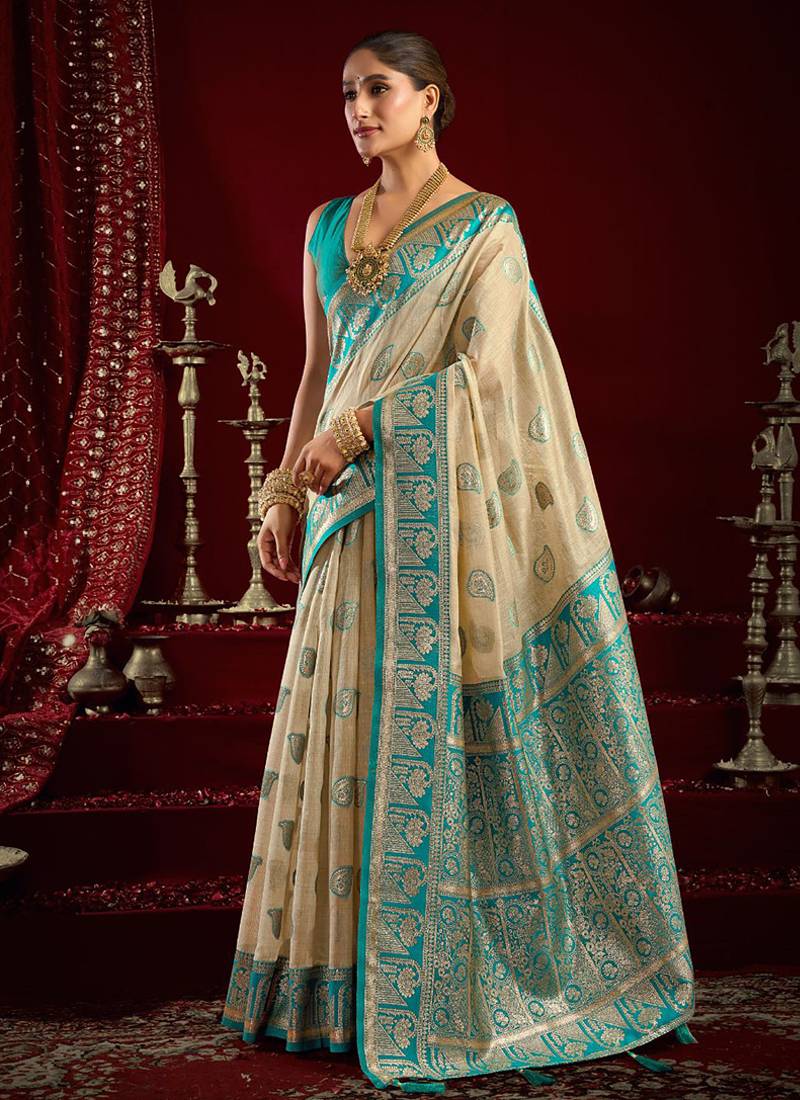 Cream soft banarasi silk blend zari woven saree with blouse piece