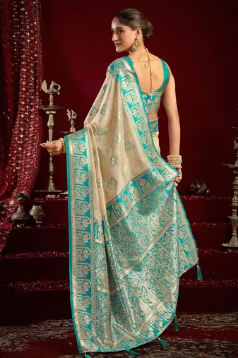 Cream soft banarasi silk blend zari woven saree with blouse piece