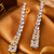 Gold Plated American Diamond Linear Drop Earrings