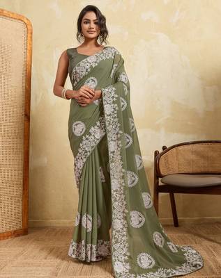 Catching olive green sequins embroidered star georgette party wear saree 1