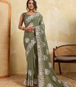 Catching olive green sequins embroidered star georgette party wear saree