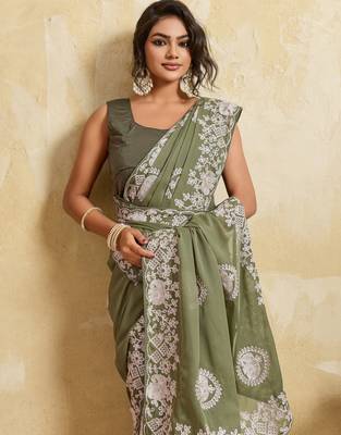 Catching olive green sequins embroidered star georgette party wear saree 2