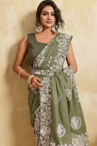 Catching olive green sequins embroidered star georgette party wear saree