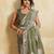 Catching olive green sequins embroidered star georgette party wear saree