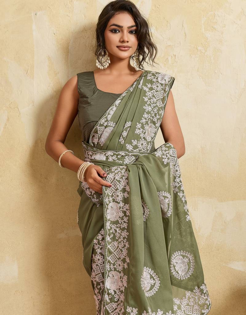 Catching olive green sequins embroidered star georgette party wear saree