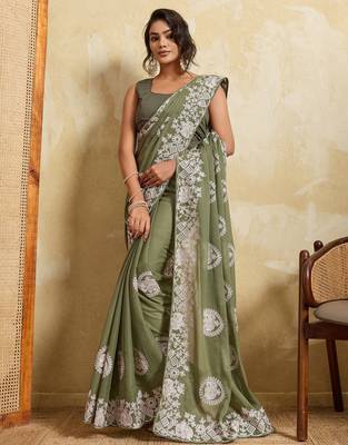 Catching olive green sequins embroidered star georgette party wear saree 3