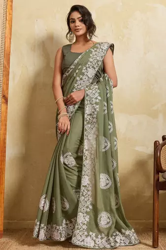 Catching olive green sequins embroidered star georgette party wear saree