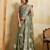 Catching olive green sequins embroidered star georgette party wear saree
