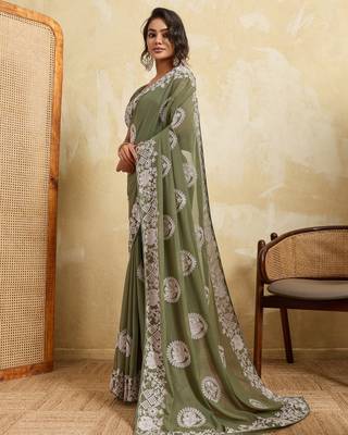 Catching olive green sequins embroidered star georgette party wear saree 4