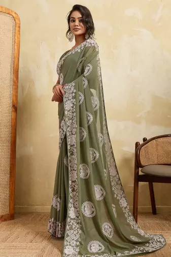 Catching olive green sequins embroidered star georgette party wear saree