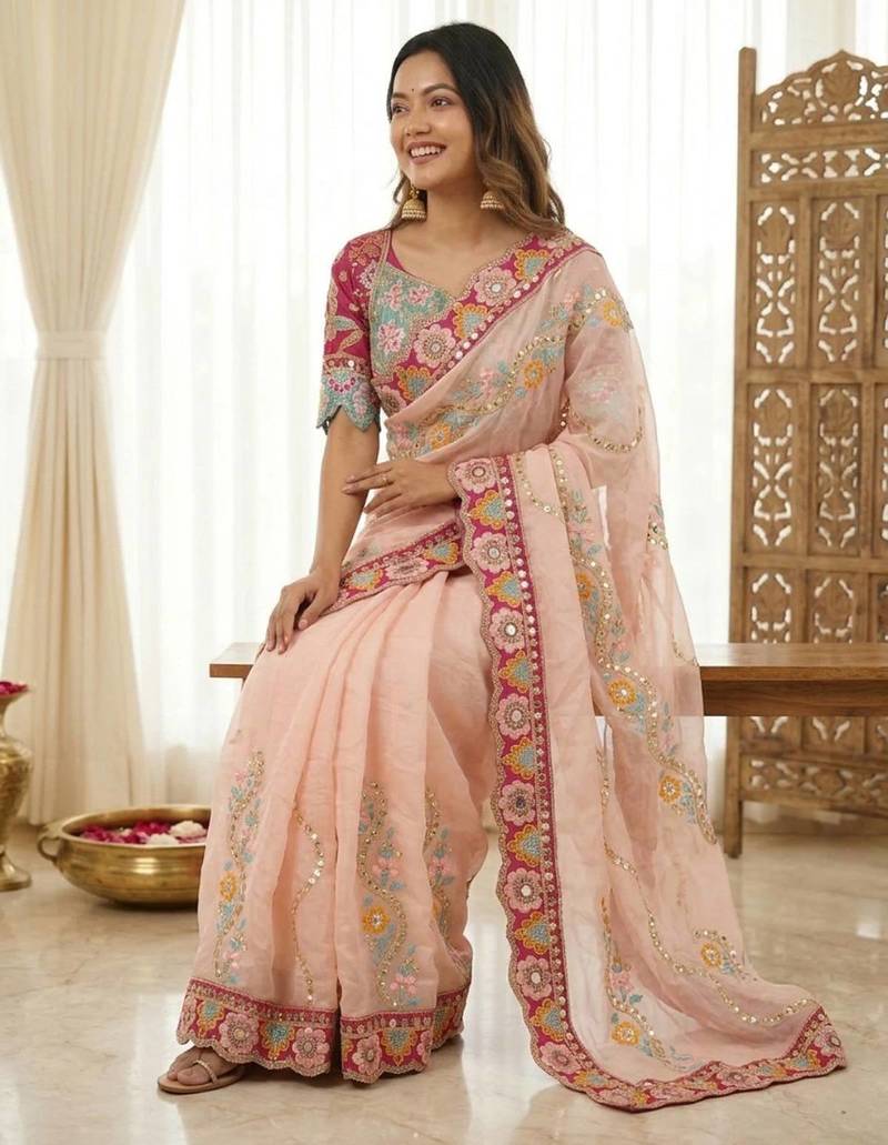 Winning peach sequins and multi colored thread embroidered with real mirror work rangoly silk party wear saree