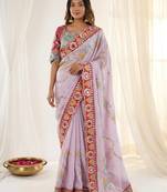 Pleasing lavendor sequins and multi colored thread embroidered with real mirror work rangoly silk traditional saree