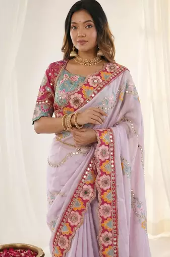 Pleasing lavendor sequins and multi colored thread embroidered with real mirror work rangoly silk traditional saree