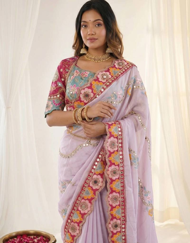 Pleasing lavendor sequins and multi colored thread embroidered with real mirror work rangoly silk traditional saree